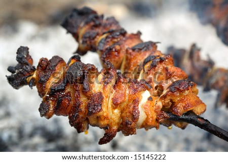 Grilled meat on a open fire grill party