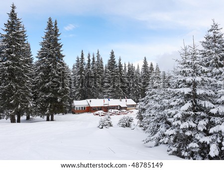 Shelter in winter forest, snowy winter mountain