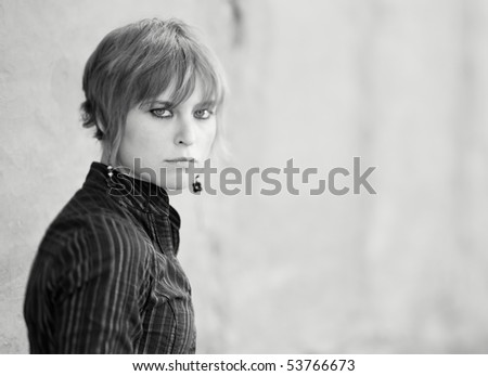 Angry young woman in black and white