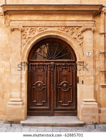 Old wooden gate in Aix en Provence, France