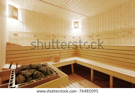 Interior of a new wooden traditional Finland-style sauna made from pine wood