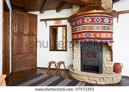 Traditional Interior Design Of Room With Fireplace In Old Wooden ...