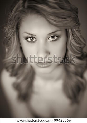 Young model woman face, pretty tall girl posing in studio