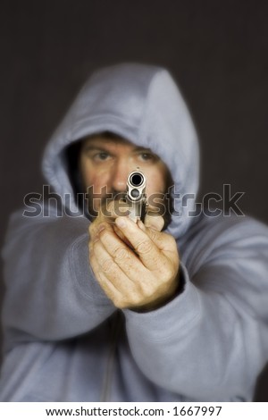 Model Release 355 Man holding gun in a threatening pose