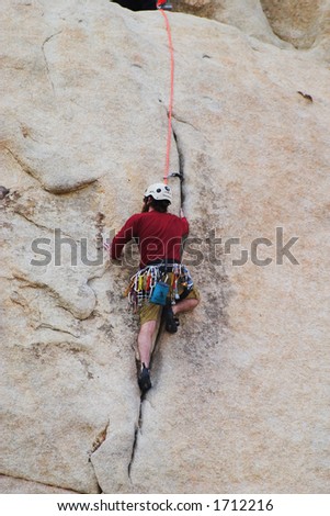 Man rock-climbing in Joshua Tree National Park. California...No Release