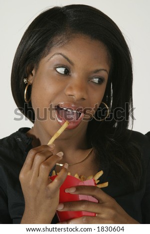  Model Release #278 African American Woman in early 20's eating junk food