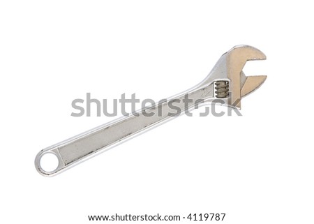 A well used adjustable wrench on a white background