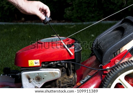 Red Lawn Mower getting some maintenance