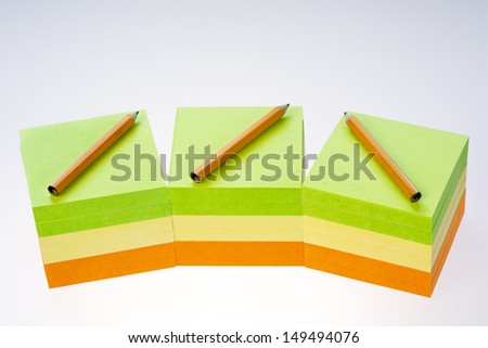 Note pads of paper and pencils