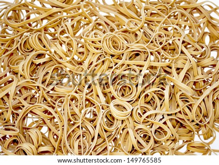 Curls of elastic rubber bands thrown together