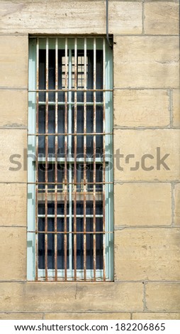 Prison bars on the outside of a building