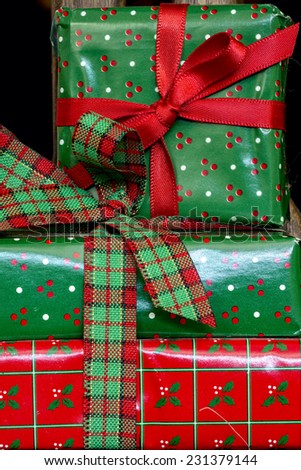 Wrapped Christmas packages in green and red