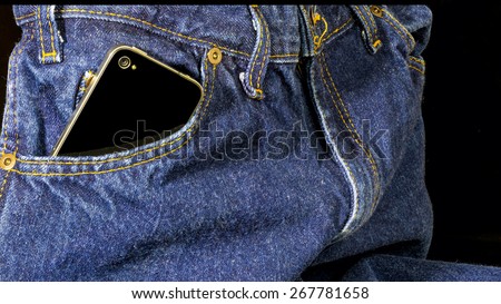 Smart phone in the front pocket of jeans