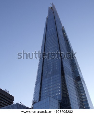 LONDON- JULY 29: The glass shard building at london bridge, now complete is the tallest building in europe at over 1,000 feet (310 metres). London, July 29, 2012.