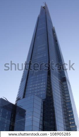 LONDON- JULY 29: The glass shard building at london bridge, now complete is the tallest building in europe at over 1,000 feet (310 metres). London, July 29, 2012.