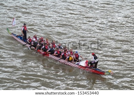 LONDON- SEPT 7: Crews rowing between tower and london bridges, visit london during river thames week, LONDON, SEPT 7, 2013