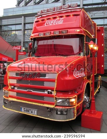 LONDON- DEC 22: The famous coca cola christmas truck, nears the end of its uk tour, with a visit to central london. LONDON, DEC 22, 2014.
