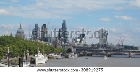 LONDON- 23 AUG: The city of londons ever changing skyline, taken with the river thames in the foreground. LONDON, 23 AUG, 2015.