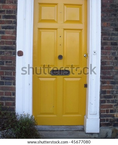 Yellow house door.
