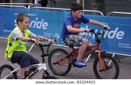 LONDON - AUG 21: Mayor of London, Boris Johnson's cycle event, SKYRIDE, visits Barking for the first time. The family event gives cyclists a traffic free route on the roads of London, Aug 21, 2011. Unidentified participants