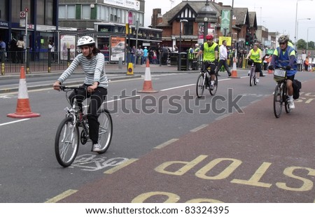 LONDON - AUG 21: Mayor of London, Boris Johnson\'s cycle event, SKYRIDE, visits Barking for the first time. The family event gives cyclists a traffic free route on the roads of London, Aug 21, 2011. Unidentified participants