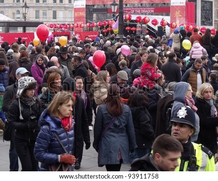 LONDON- JAN 29: Crowds of 1000s celebrate the year of the dragon chinese new year in trafalgar square and chinatown. London, jan 29, 2012.