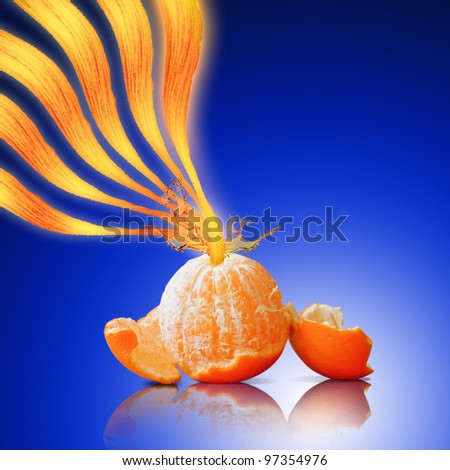 Orange juice splashing isolated on blue background