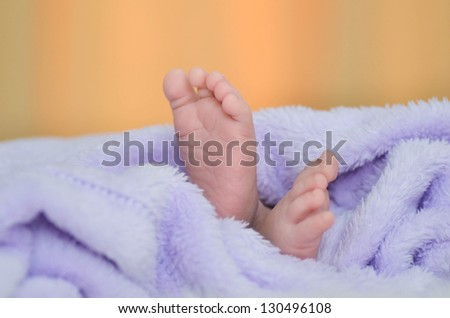 little foot of newborn baby