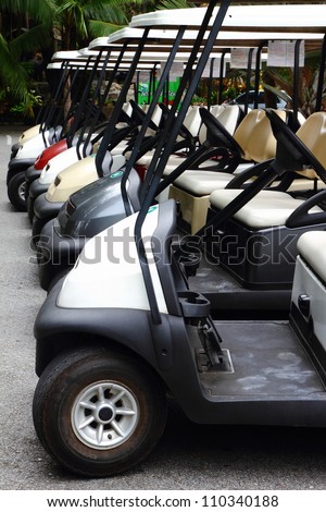 Golf carts on a parking lot