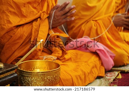 Holy water, the monks and religious rituals in buddhist ceremony.