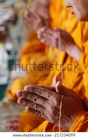pray, the monks and religious rituals in thai Buddhist ceremony.