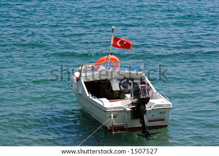 A power boat moored in the Mediterranean off the Turkish coast.