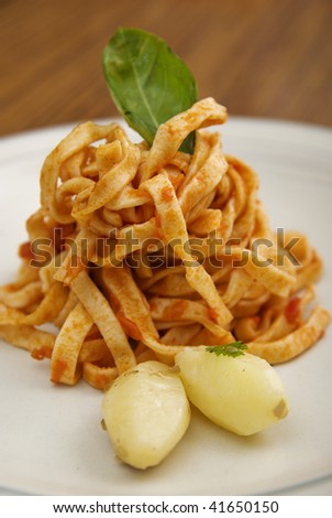 fettuccine pasta with tomato basil sauce and steamed potatoes