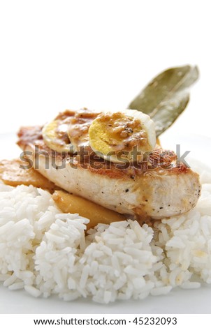 delicious adoboe chicken breast fillet with potatoes, slices of hard boiled eggs and rice