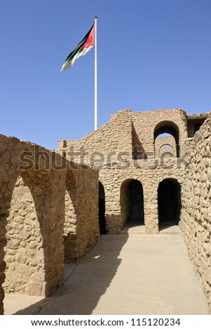 Aqaba mamluk fort with jordanian flag in background, Aqaba, Jordan, Middle East