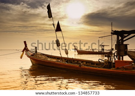 Thai fishing boats at sunset, moored at Khuk Khak, Khao Lak, Phang-Nga Province, Thailand, Asia