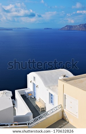 Whitewashed villa overlooking the caldera in Oia, Santorini, Cyclades, Greece