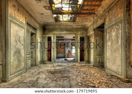 Decayed corridor in an abandoned central office of factory Decayed corridor in an abandoned central office of factory
