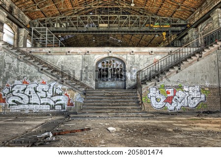 Imposing staircases inside the hall of an abandoned coal mine, HDR
