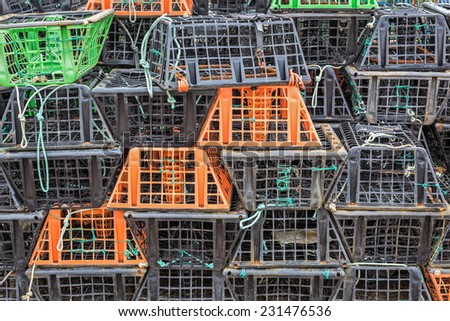 Stacked lobster and crab traps in the port of Santa Luzia, Algarve, Portugal, Europe