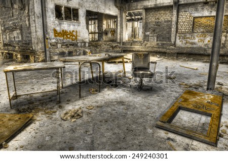 FRANCE - SEPTEMBER 18: Decayed furniture in an abandoned manufacture on September 18, 2011 somewhere in France