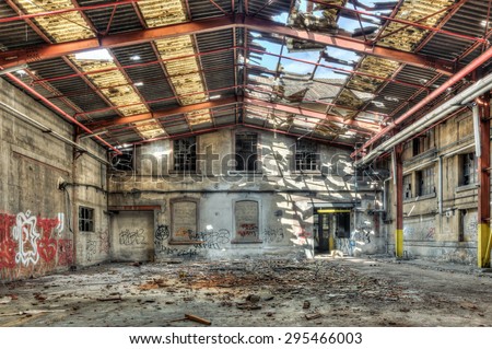 Collapsed roof in an abandoned factory warehouse