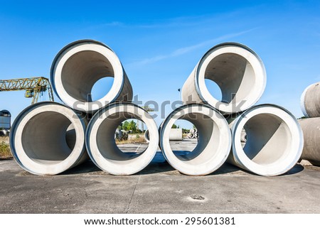 Big concrete sewage pipes stored in a factory