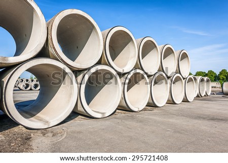 Big concrete sewage pipes stored in a factory