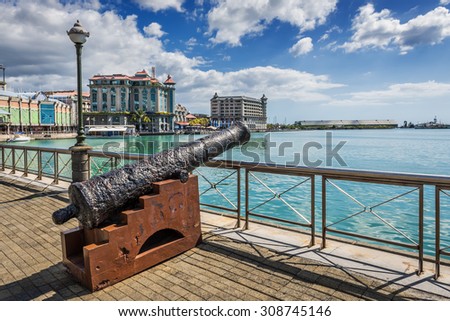 Old cannon on the promenade at Caudan Waterfront, Port Louis, Mauritius, Indian Ocean