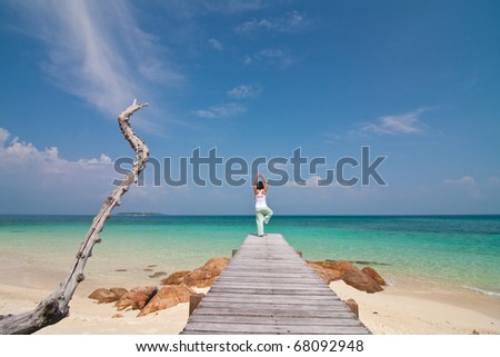 stock photo : Young beautiful women relaxation on the sunny beach , Munnork Island, Rayong