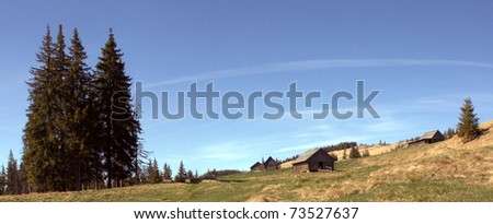 Old houses in mountains in spring