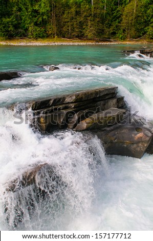 Waterfall and river views of the scenic Frasier River, Mount Robson Provincial Park, British Columbia Canada