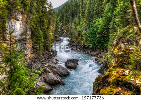 Waterfall and river views of the scenic Frasier River, Mount Robson Provincial Park, British Columbia Canada