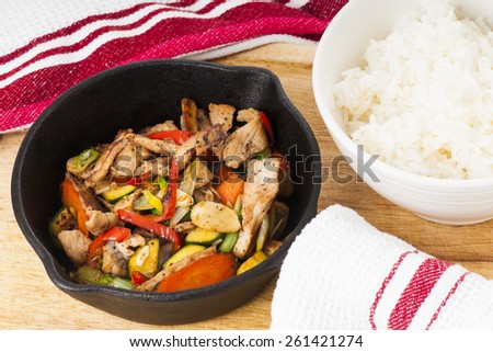 Spicy Mexican pork stirfry in a cast iron skillet
